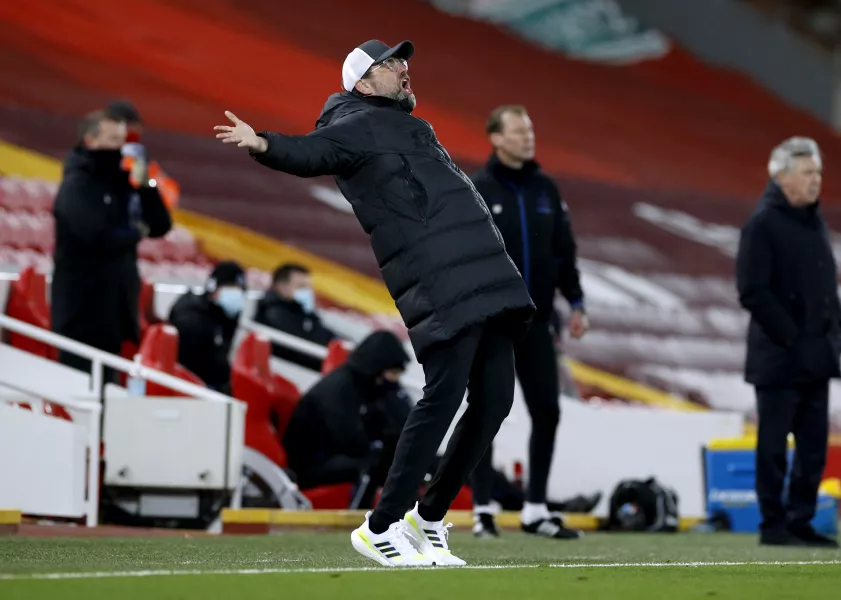 Liverpool manager Jurgen Klopp throws his arms wide on the touchline