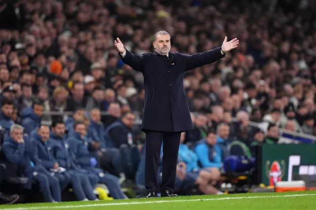 Ange Postecoglou holds his arms out in frustration on the touchline