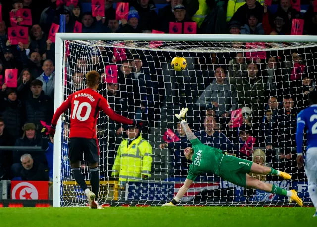 Marcus Rashford lashes home his side's second from the penalty spot 