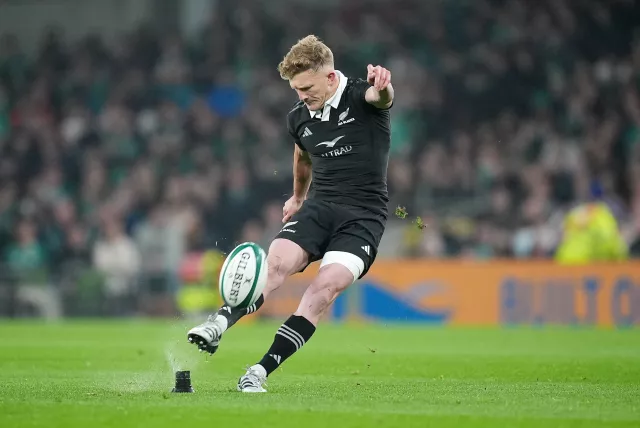 Damian McKenzie kicks a penalty for New Zealand