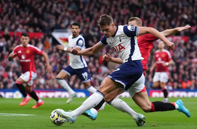 Micky van de Ven crosses left foot to set up Tottenham's opening goal 