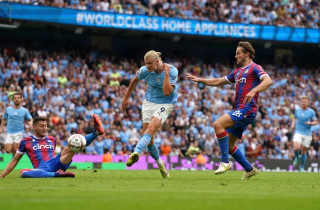 Erling Haaland, centre, completes his hat-trick against Crystal Palace