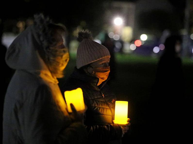 Vigil held as bodies of mother and two children removed from Dublin house