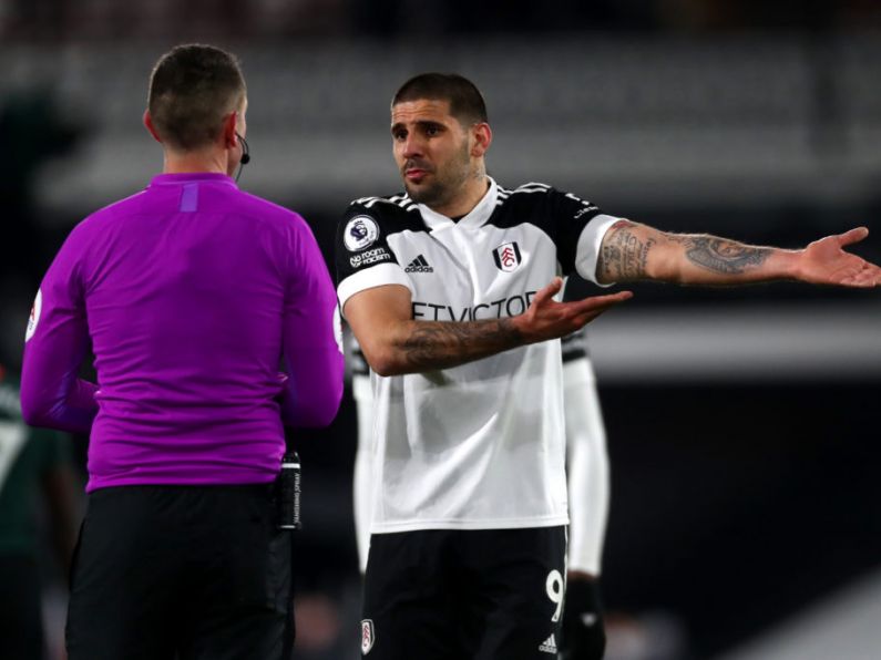 Tottenham benefit from handball rule to claim valuable victory at Fulham