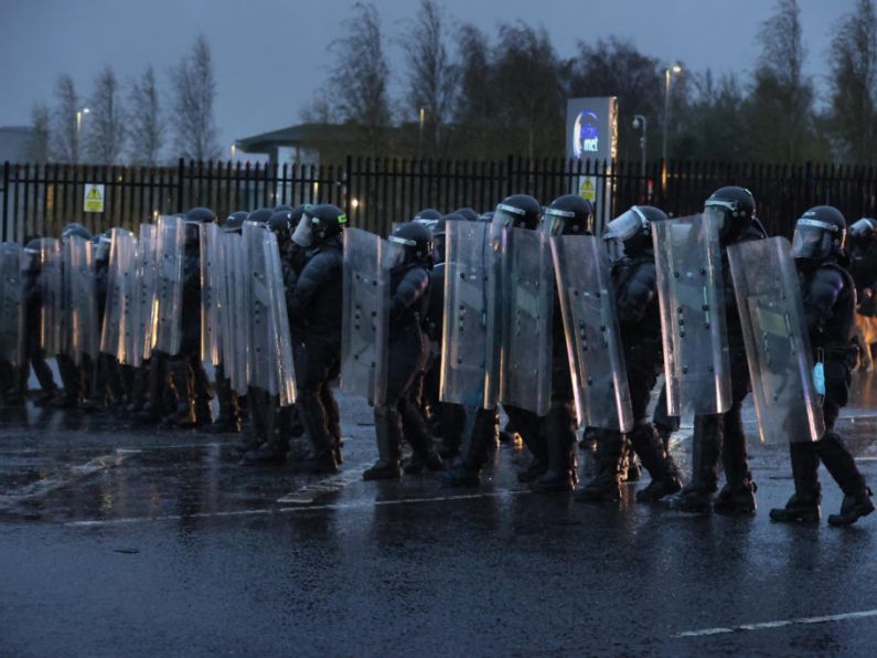 Two men charged over west Belfast riots to appear in court