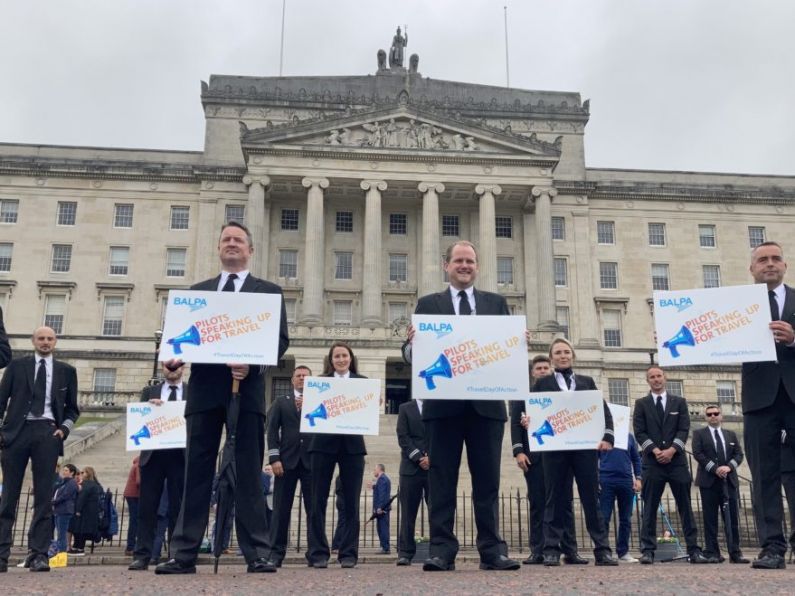Demonstrators urge Stormont politicians to support travel sector