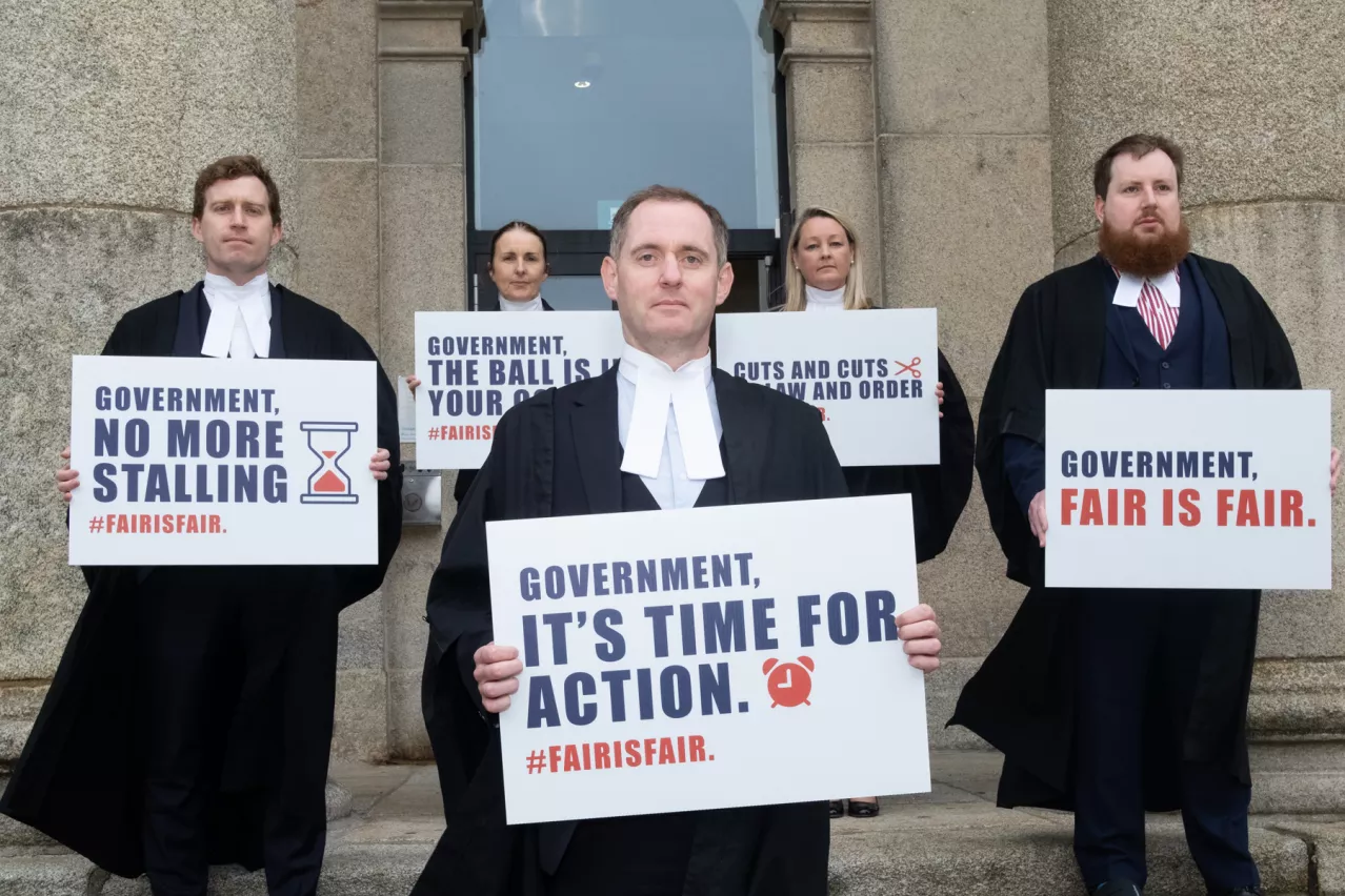 Protests took place at 16 courthouses today as part of a nationwide withdrawal of service by criminal barristers, in response to a lack of progress on fee restoration. This was the first of three planned days of withdrawal this month and is an escalation on the unprecedented action taken by criminal barristers all over the country last October. The full range of FEMPI-era cuts that were applied across the public sector continue to apply to the profession and the unilateral breaking of the link to public sector pay agreements has yet to be restored. Pictured at Waterford Courthouse are Conor O'Doherty, Claire Collins, Mary O'Dwyer, Paul Hutchinson and Tom Kelly, all from Waterford- David Clynch