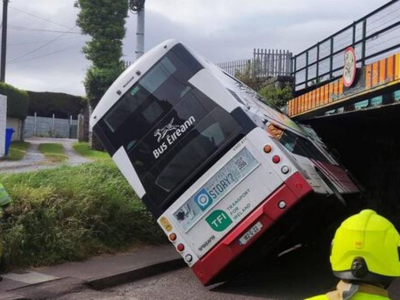 Double-decker bus crashes into Cork railway bridge