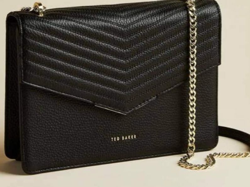 Lost : a black and gold Ted Baker handbag