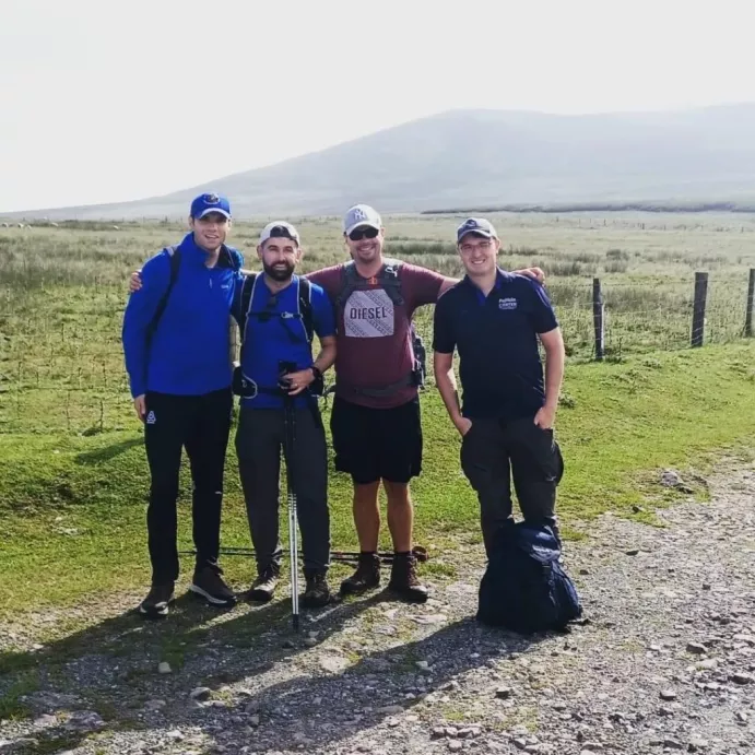 WLR'S Kieran Foley (Left) pictures with walkers at the Comeragh Challenge on Saturday