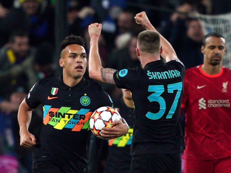 Liverpool reach last eight of Champions League despite rare Anfield loss