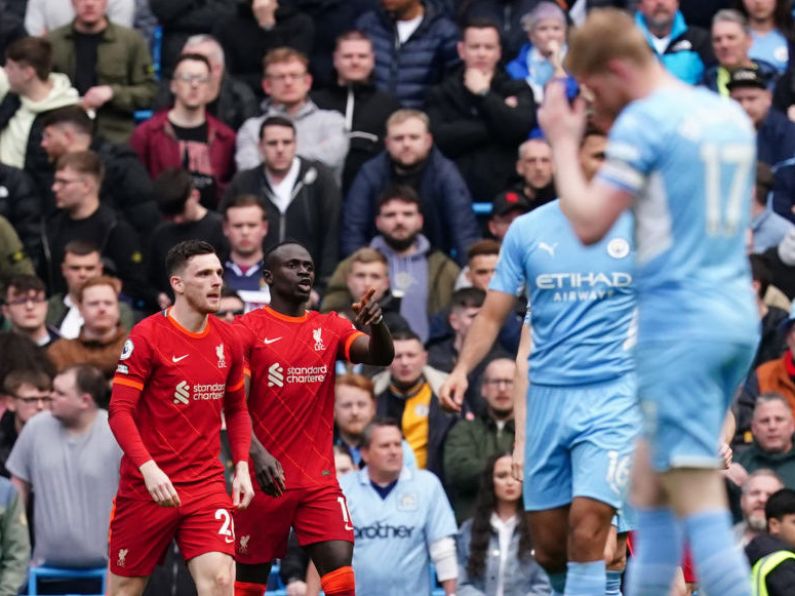 Manchester City retain Premier League lead after Liverpool draw