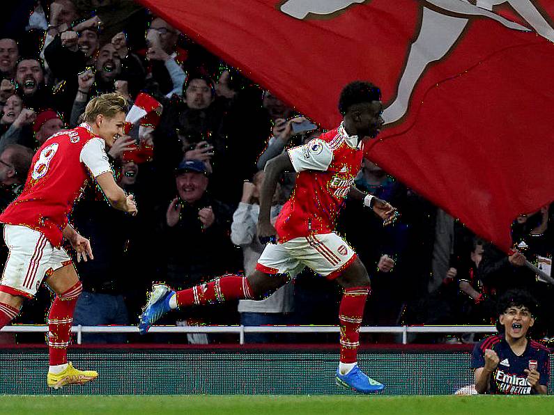 Arsenal back to summit after thrilling win over Liverpool