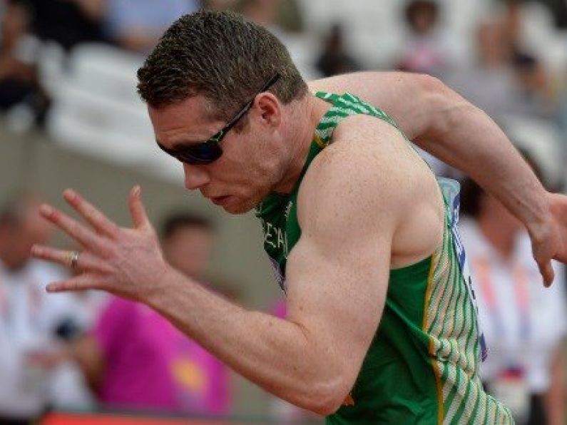 Jason Smyth runs season's best in T-13 200m heats on way to final