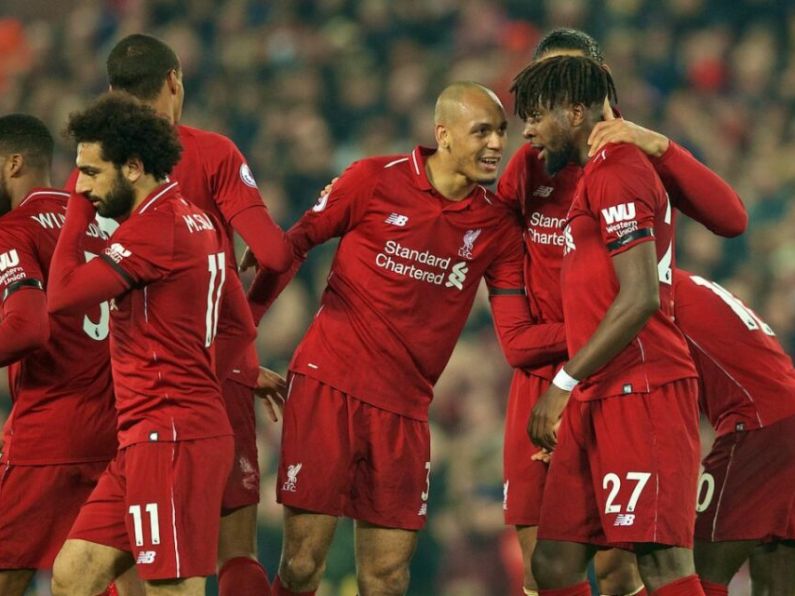 Liverpool remain one point clear at top of Premier League table after facile win over Watford