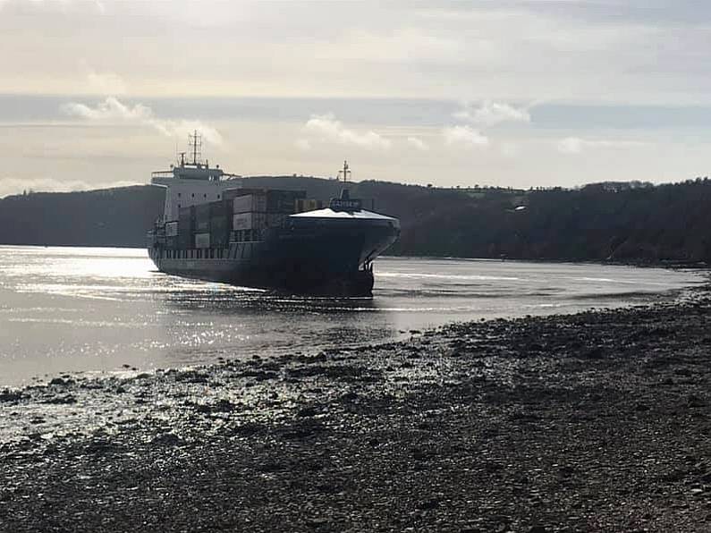 A container ship has safely docked in Waterford Port after it ran aground earlier