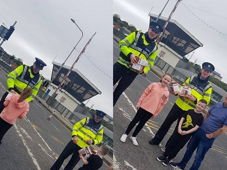 Waterford children present Gardai with Easter Eggs at checkpoint