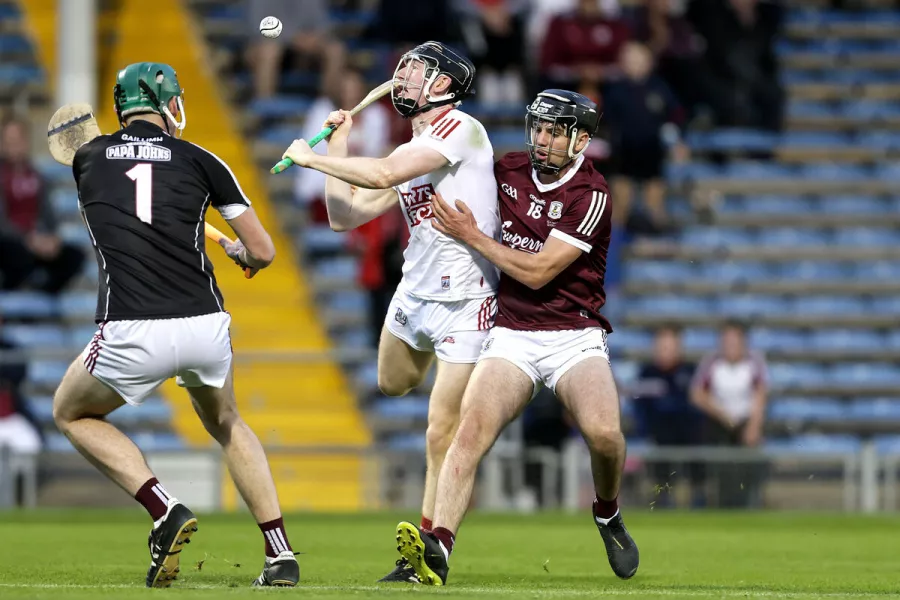 Cork's Jack Cahalane with Galway goalkeeper Paddy Rabbitte and Shane Morgan. Picture: INPHO/Laszlo Geczo