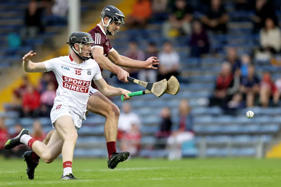 Cork's Jack Cahalane and Eoghain Geraghty of Galway. Picture: INPHO/Laszlo Geczo